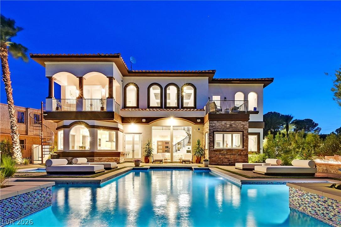 Image 1: This magnificent residence boasts a resort-style p