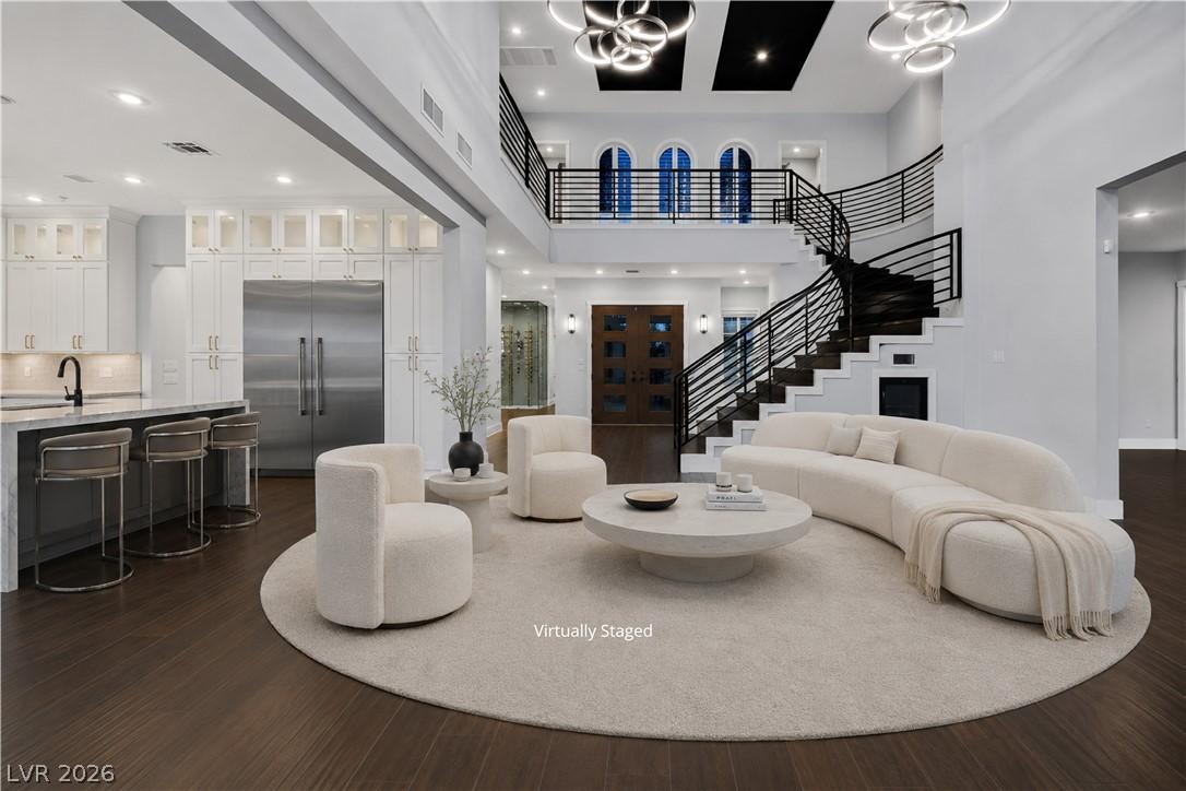 Image 2: &ldquo;Virtually Staged&rdquo;  This grand room features a d
