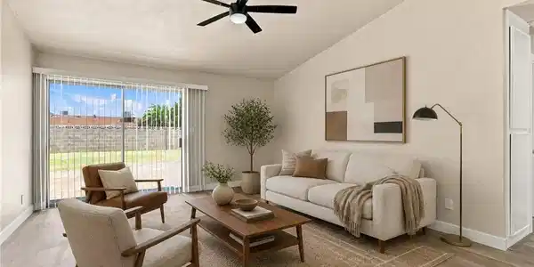Image 2: **Virtually Staged** A comfortable living area wit