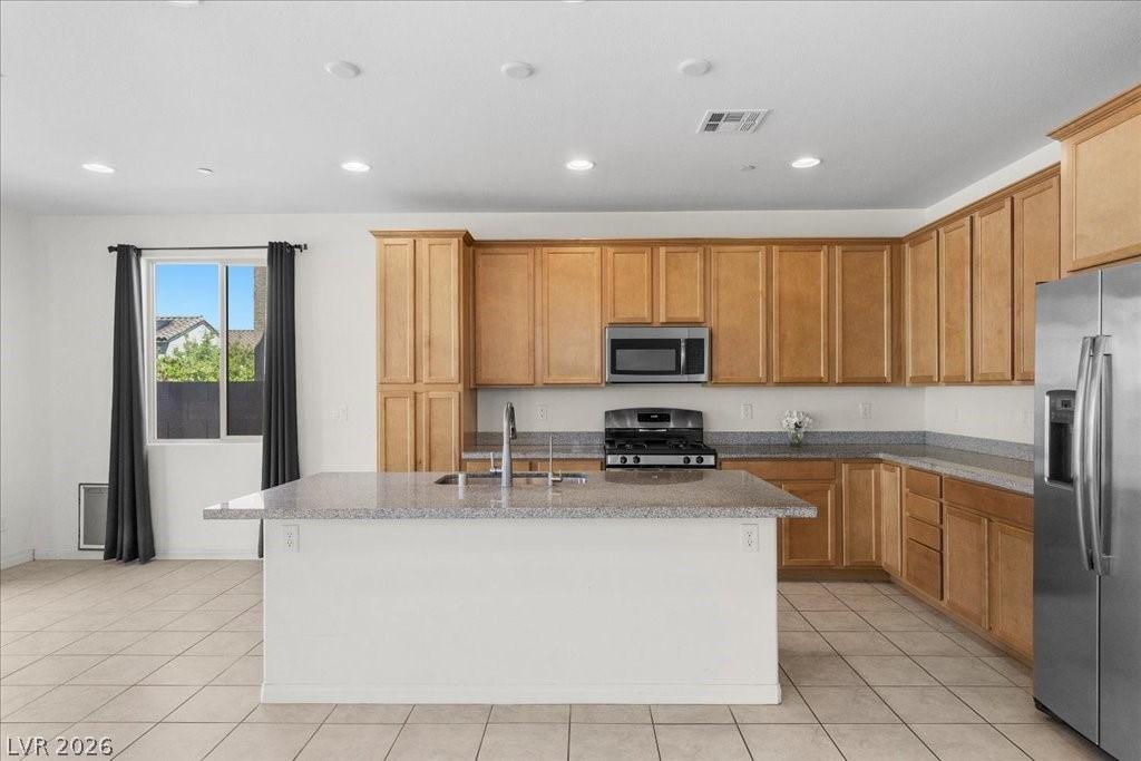 Image 2: Kitchen featuring stainless steel appliances, a ce