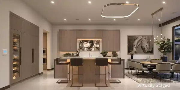 Image 3: A well-lit, contemporary kitchen and dining space