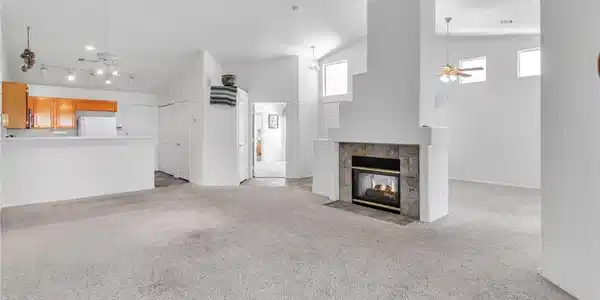 Image 2: Unfurnished living room featuring ceiling fan, lig