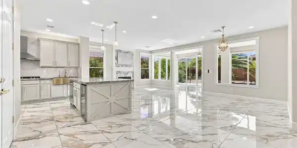 Image 4: Polished tile flooring reflects abundant natural l
