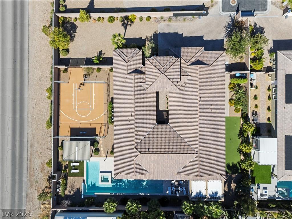 Image 1: Aerial view of property, pool, gazebo with fire pi