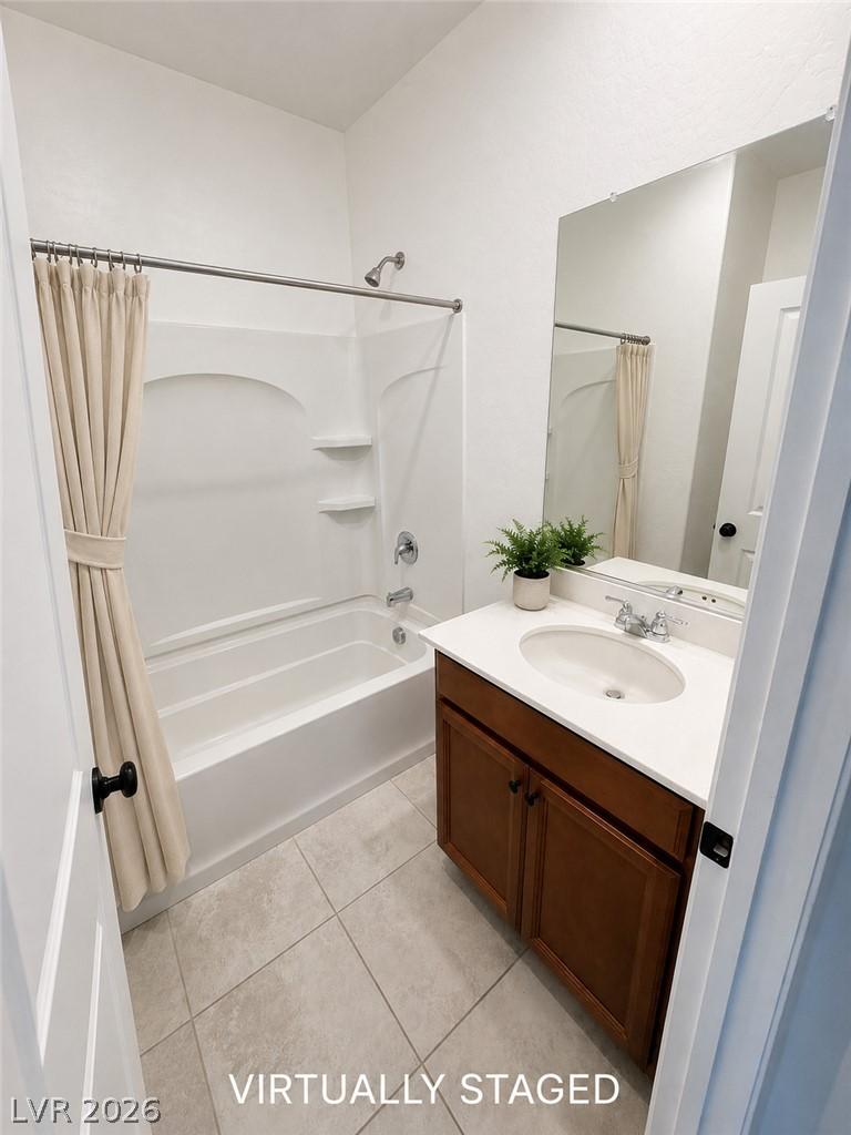 Image 4: A pristine bathroom features a shower-tub combinat
