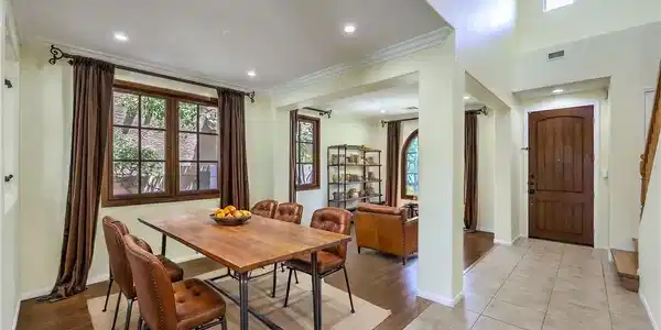 Image 3: A spacious entry foyer seamlessly transitions into