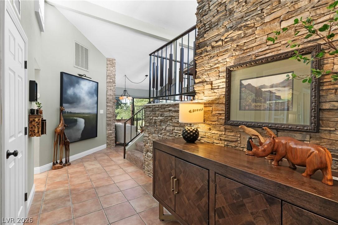 Image 4: Enter this inviting foyer, featuring architectural