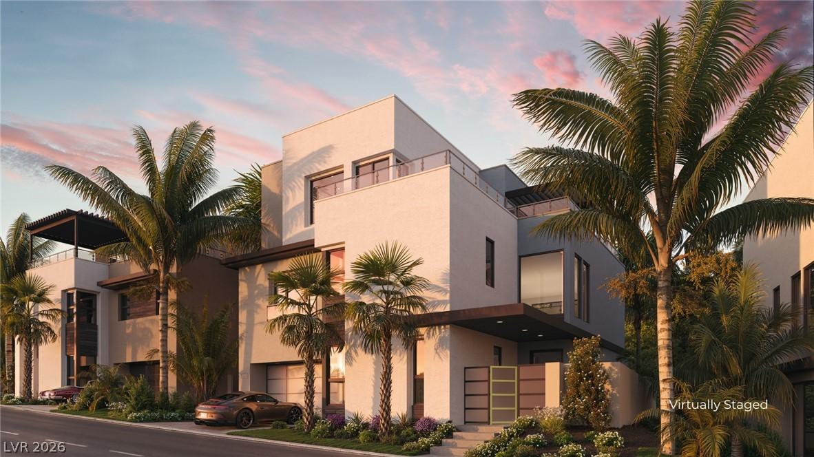Image 1: Modern architecture with expansive windows and lar