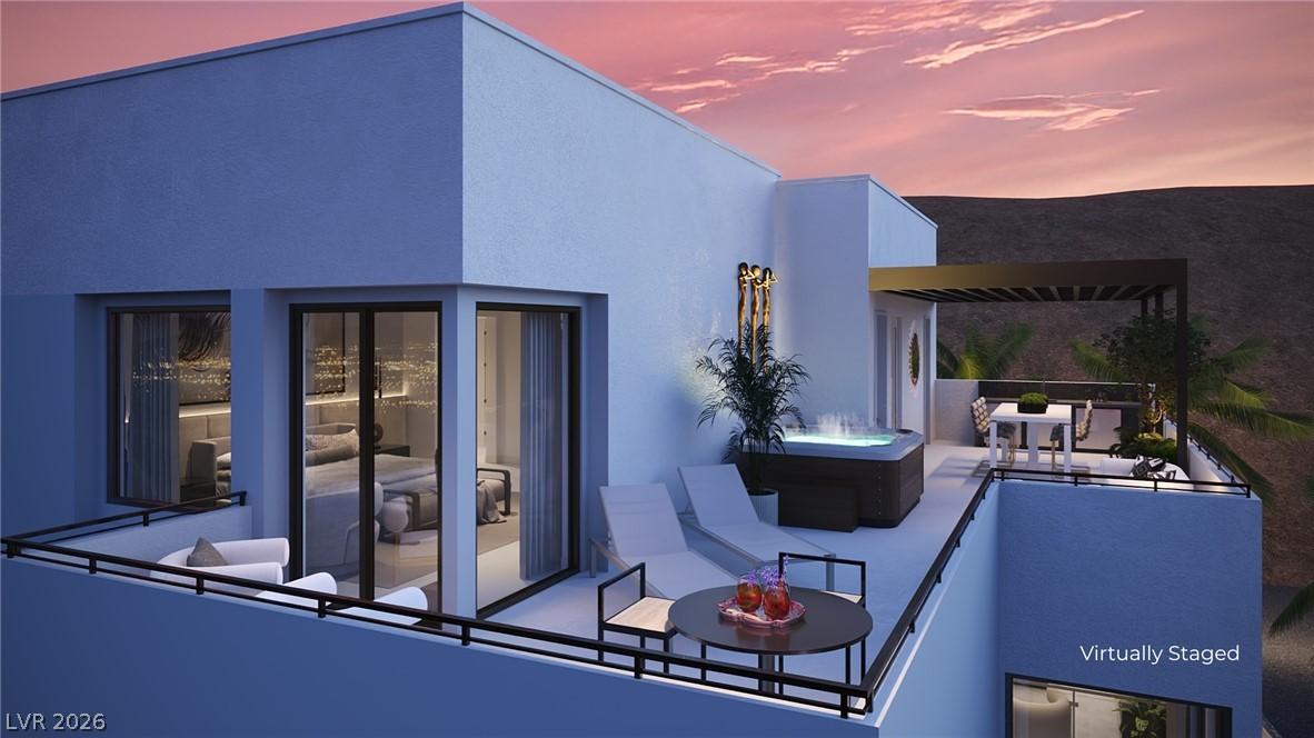 Image 2: A spacious wrap around third floor deck offers daz