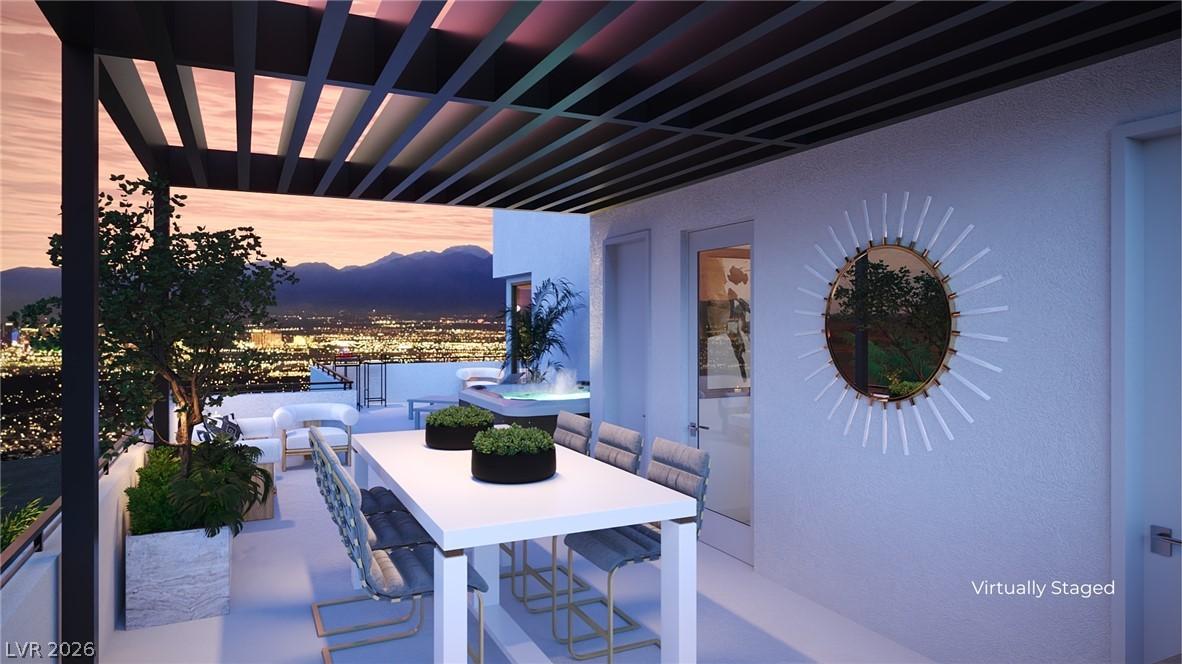 Image 3: An open-air deck with strip views perfect for ente