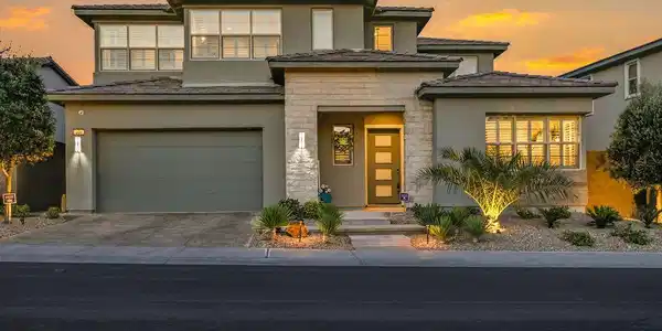 Image 4: An elegant contemporary facade showcases stone acc