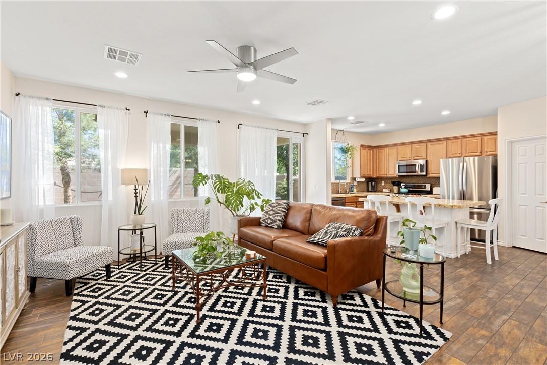 Image 4: An inviting open floorplan seamlessly connects the
