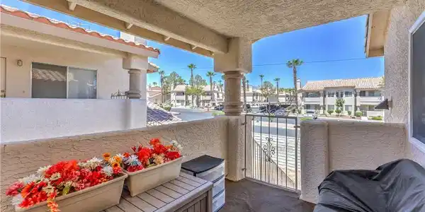 Image 3: Enjoy outdoor moments on this covered patio, offer