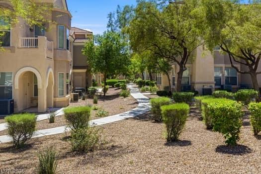 Image 4: Serene walking paths with mature landscaping just