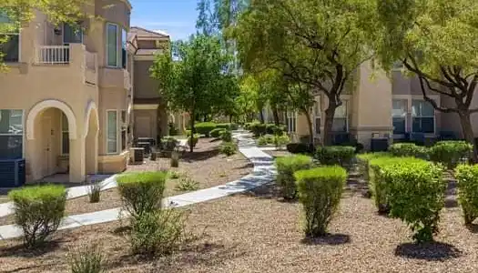 Image 4: Serene walking paths with mature landscaping just