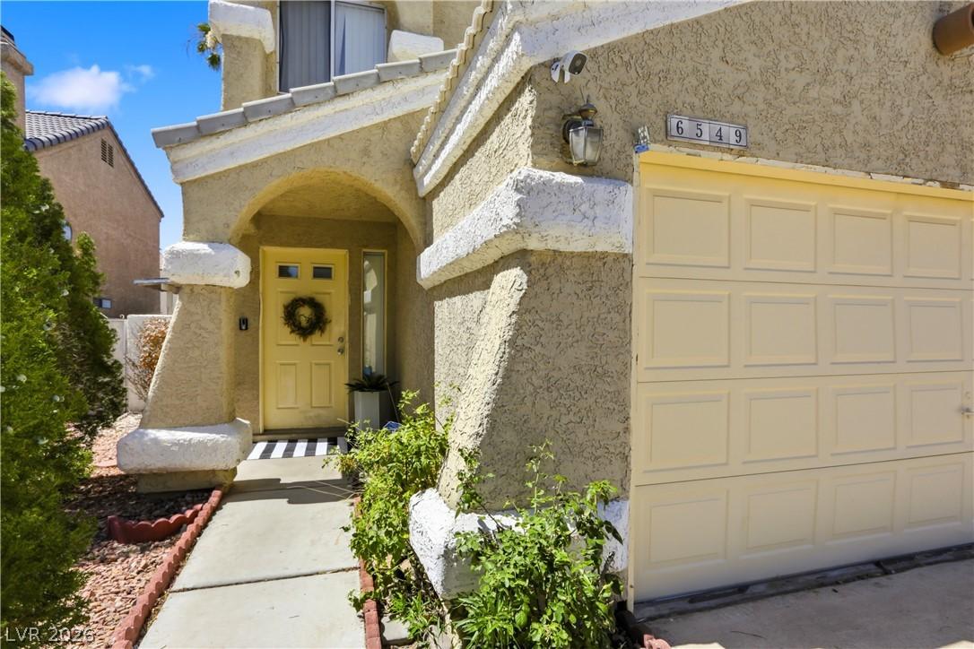 Image 4: A welcoming front entrance, featuring a sunny yell