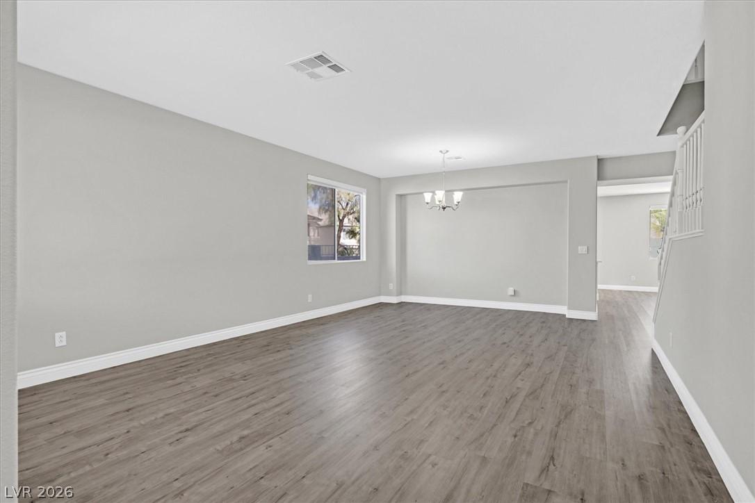 Image 4: A well-lit, open-concept living space with resilie