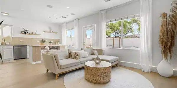 Image 3: Clean lines and warm hardwood floors define this i