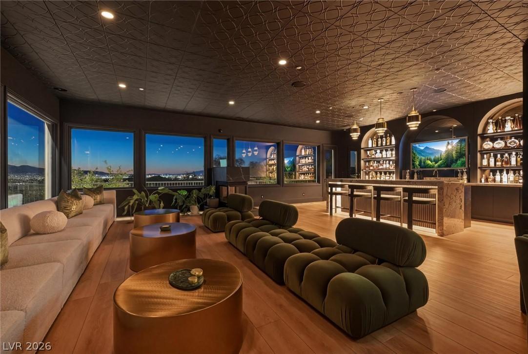 Image 1: Third-floor lounge featuring a private speakeasy a