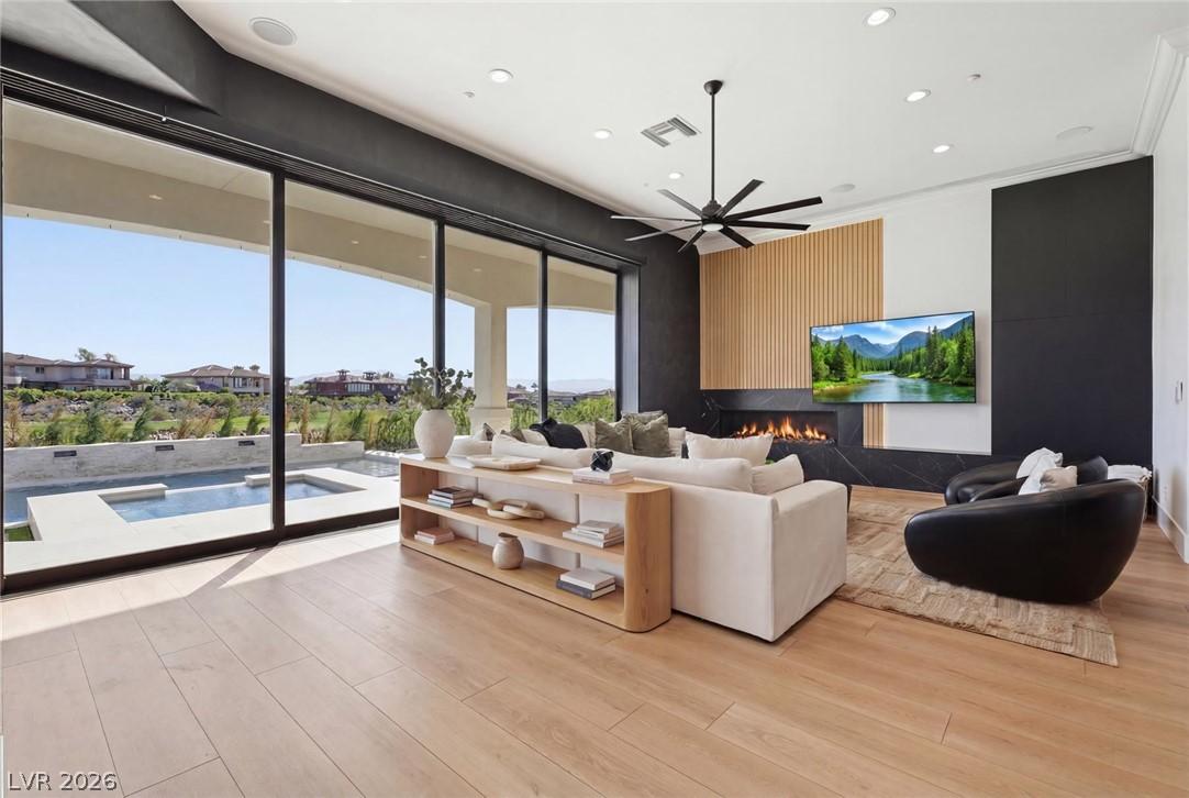 Image 2: Dramatic living room featuring soaring vaulted cei