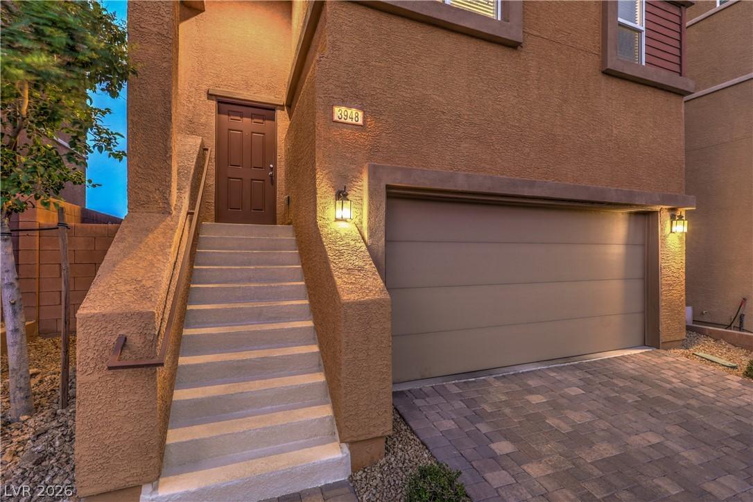 Image 2: A welcoming front entrance with a long stairway, a