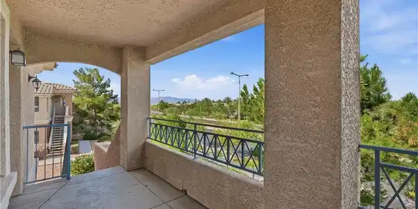 Image 3: Balcony, located by the front door.