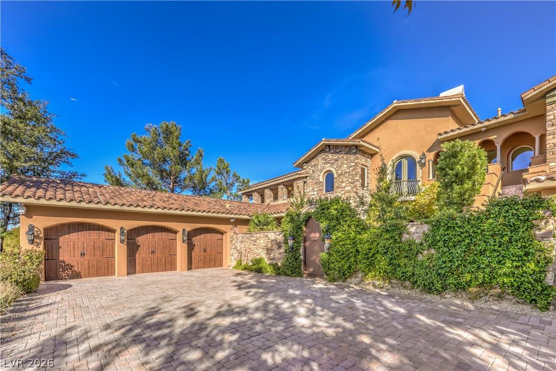 Image 1: A grand Mediterranean-inspired residence, featurin