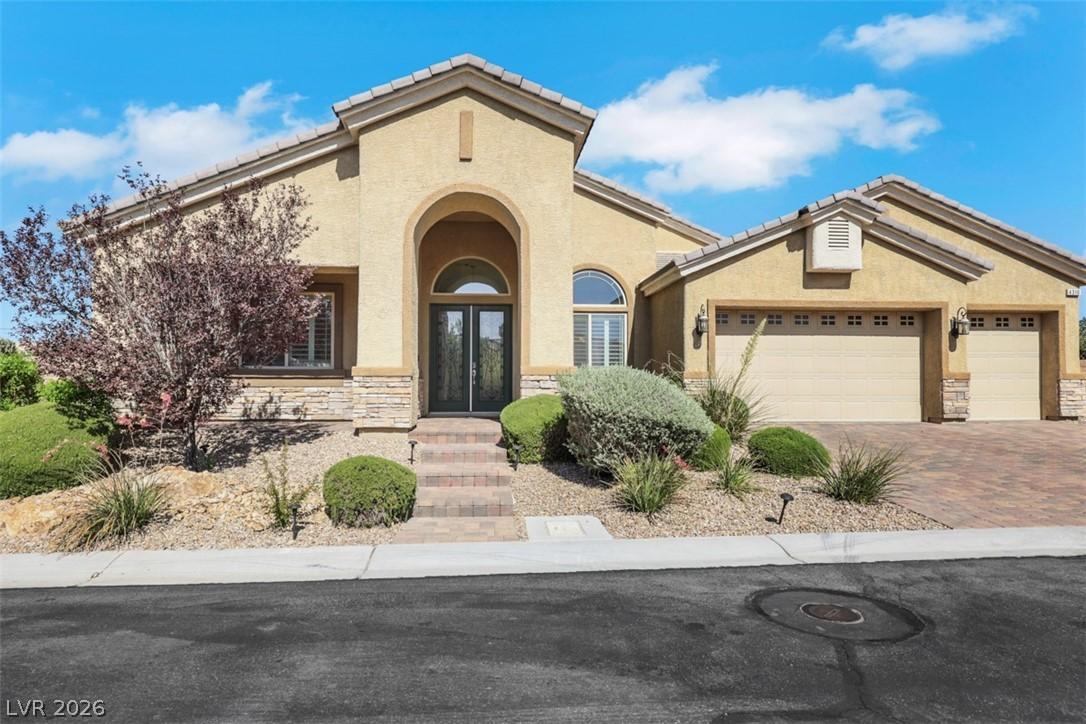Image 1: A striking desert-style abode featuring an invitin