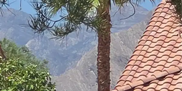 Image 4: Dramatic mountain vistas frame this property, boas