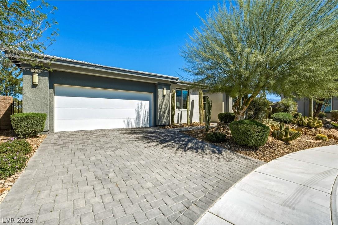 Image 2: View of front of house featuring decorative drivew