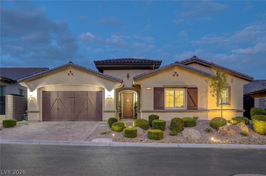Image 4: A welcoming facade presents a private front entry