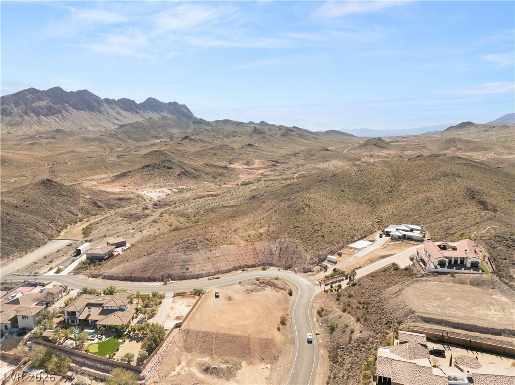 Image 1: Perched amidst a rugged desert landscape, this pro