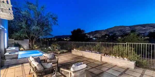 Image 2: Overlooking nightly Lit mountain . Three tier fire