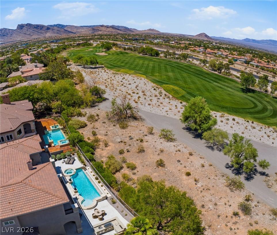 Image 2: An aerial perspective reveals a property, overlook