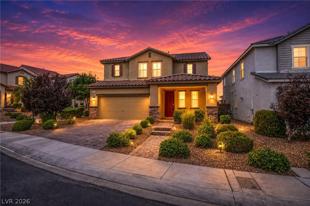 Image 4: Dramatic sunset hues enhance this home's inviting
