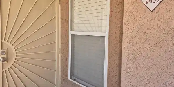 Image 4: Secure entry is provided by a decorative security