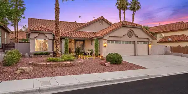 Image 4: Charming single-story with a Spanish tile roof, ma