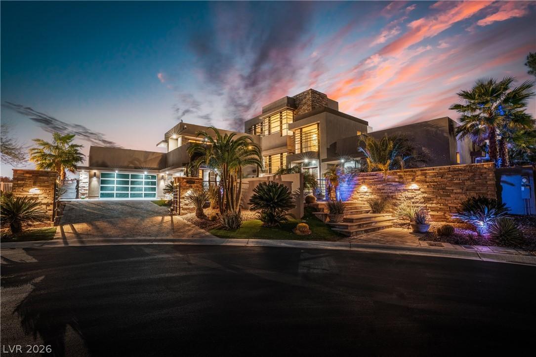 Image 1: This contemporary residence boasts captivating cur