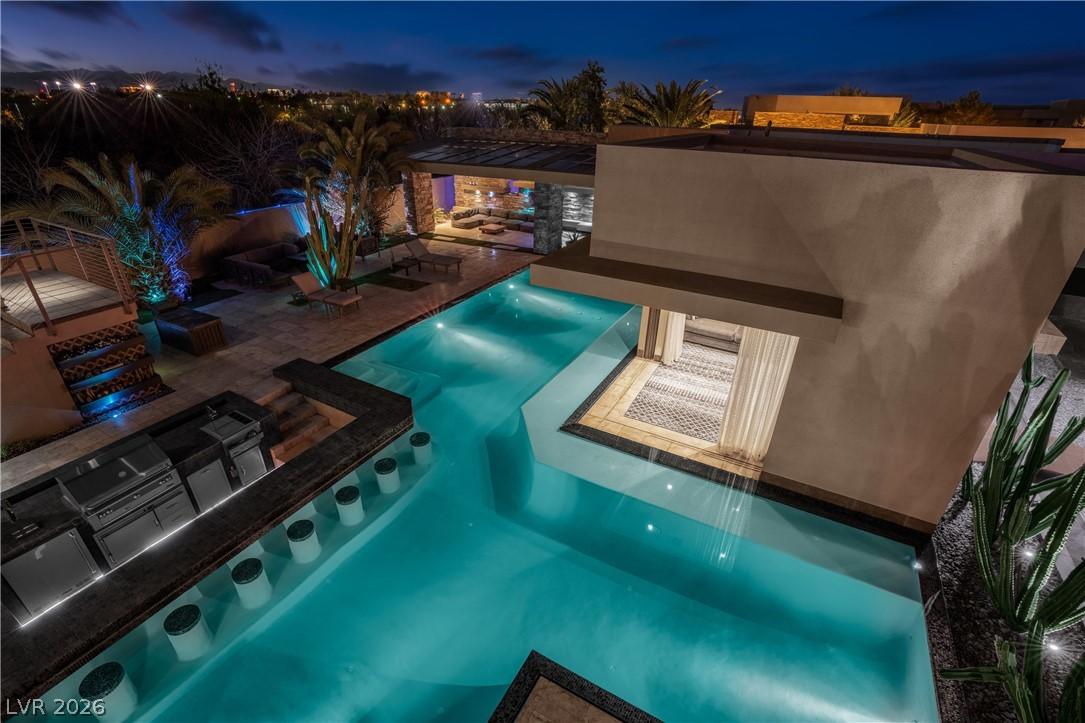 Image 3: This alluring outdoor retreat features a luxurious