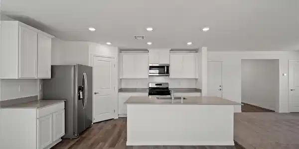 Image 4: Recessed lighting illuminates this contemporary ki