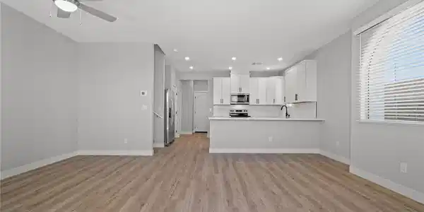 Image 2: Clean lines and durable wood-look flooring flow se