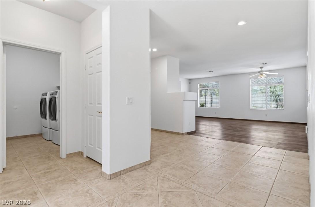 Image 4: Bright interior features wood flooring in the livi