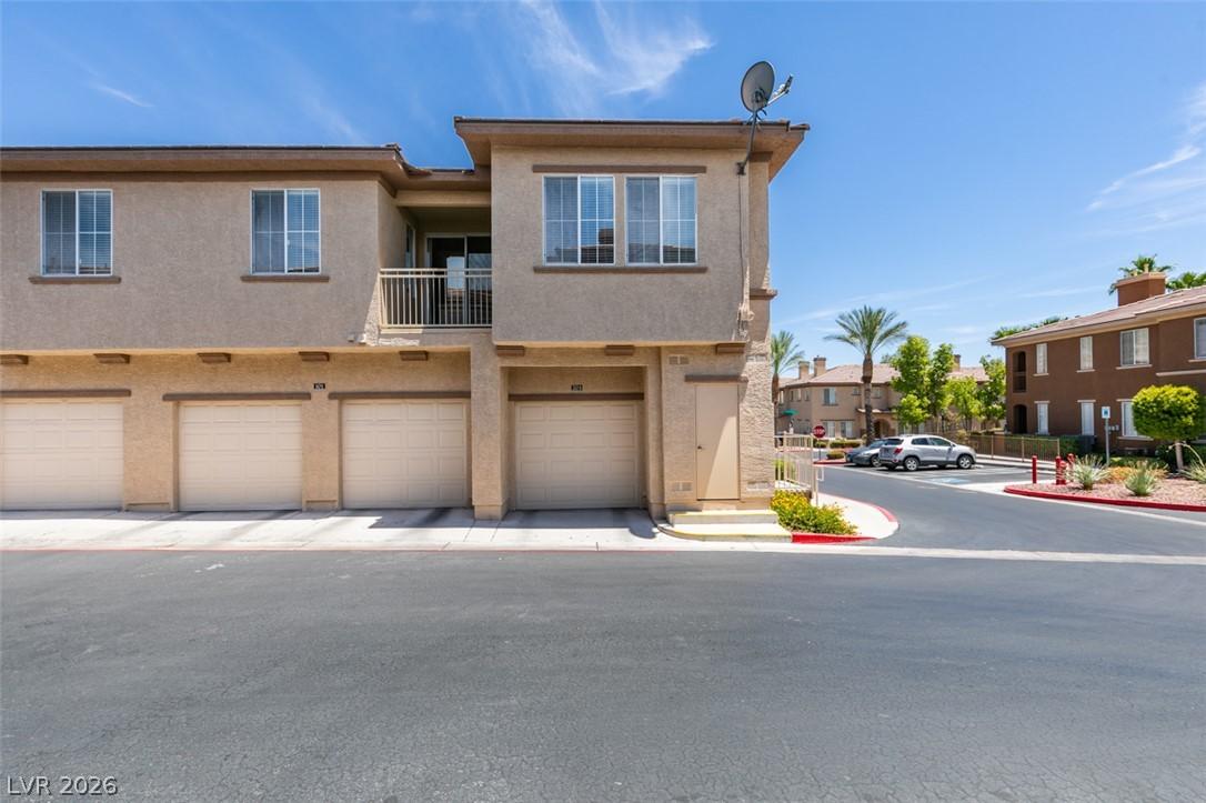 Image 2: Multi-level Condo complex with individual garage,
