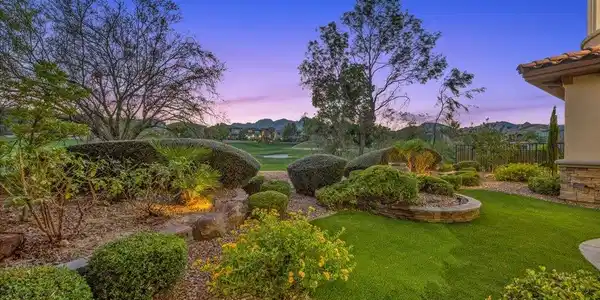 Image 4: Golf course frontage with mature landscaping and w