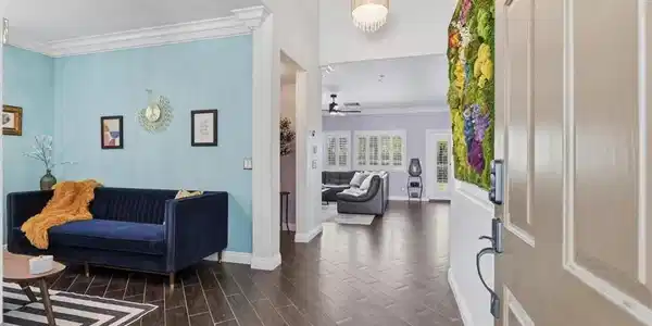 Image 4: An inviting entrance foyer reveals tile flooring,