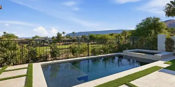 Image 2: A private pool and spa offer refreshing relaxation