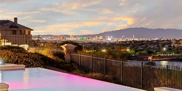 Image 3: Infinity Pool-Glittering  Las Vegas Strip and moun