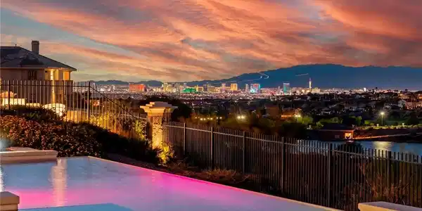 Image 4: Strip, and Mountain Views from the backyard on a d
