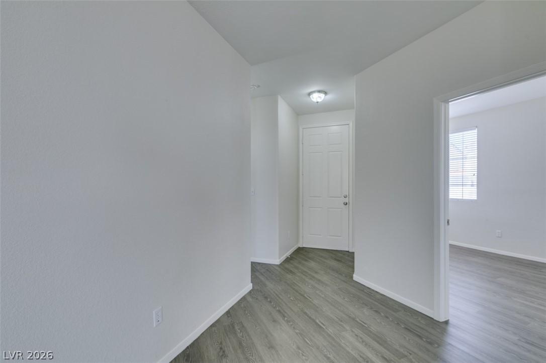 Image 4: This entry hall features durable flooring and lead