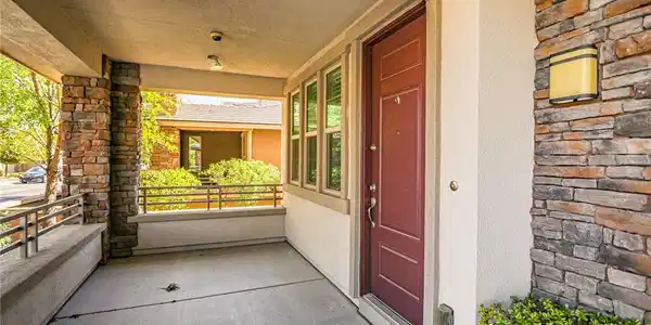 Image 3: Stone pillars and a covered concrete floor create